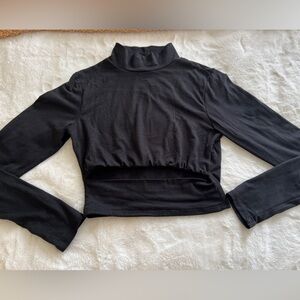 Urban Outfitters Black Crop Long Sleeve Top w/Cutout detail in front.